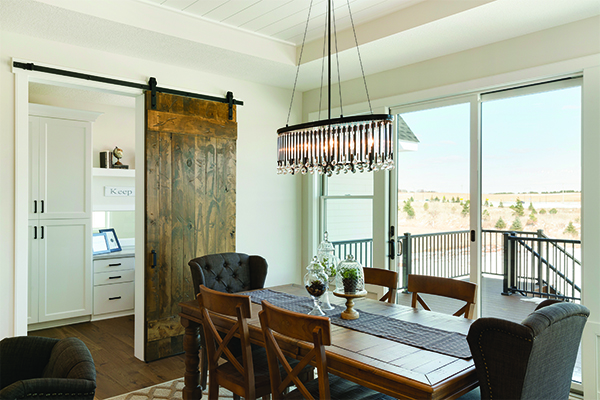 Dining room with Andersen gliding glass door leading to patio.