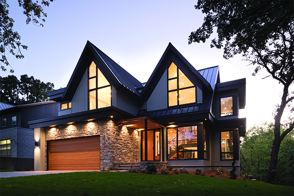 Front of a modern home with large Andersen windows. 