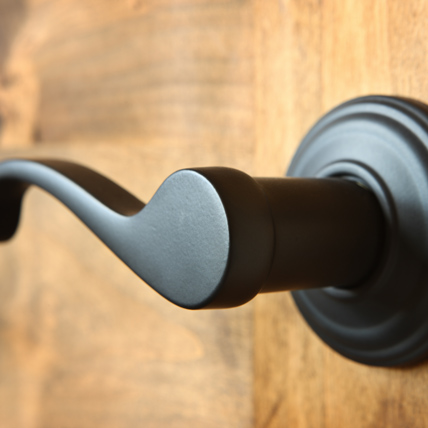 A close up of a door handle. 