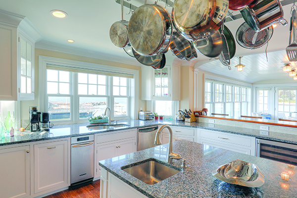 Kitchen with Andersen French wood windows overlooking the ocean. 